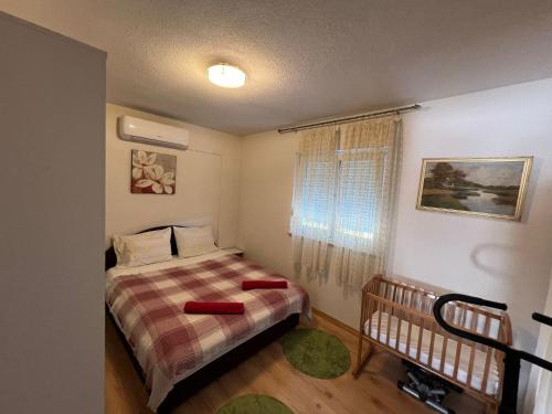 Una cama o camas en una habitación de Vila Dolce Vita Mostar