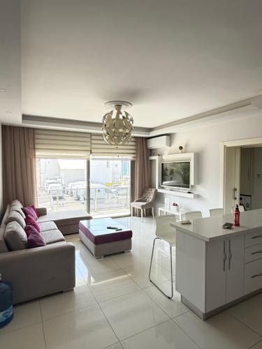 a living room with a couch and a table at Nicosia's Diamond in Nicosia