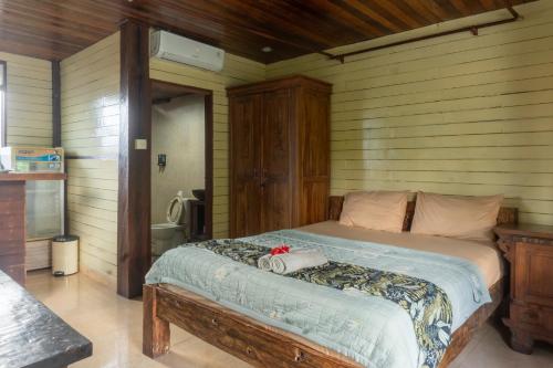 Ningmas Garden By Sidhi Hospitality Experiencesにあるベッド
