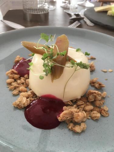 a dessert on a plate with food on it at The Commodore Hotel in Instow