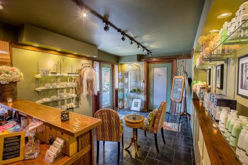 a room with chairs and a counter in a store at Stroudsmoor Country Inn in Stroudsburg