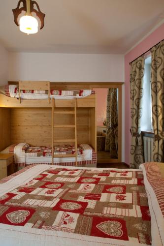 Postel nebo postele na pokoji v ubytování Hotel Sport