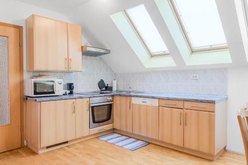 Кухня или мини-кухня в Apartment Gaspercic
