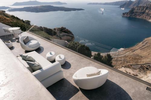 a living room with a view of the ocean at Nelya Suites in Megalokhori