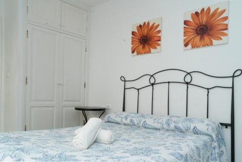 Ένα ή περισσότερα κρεβάτια σε δωμάτιο στο ApartamentosMora