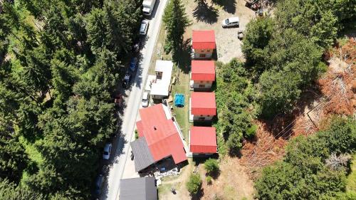 an overhead view of a house with red roof at Resort Komovi in Kravlja