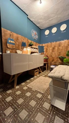 a dressing room with a sink and a counter at Avaluna 6 osobe max - shower outside tus spolja in Vrčin