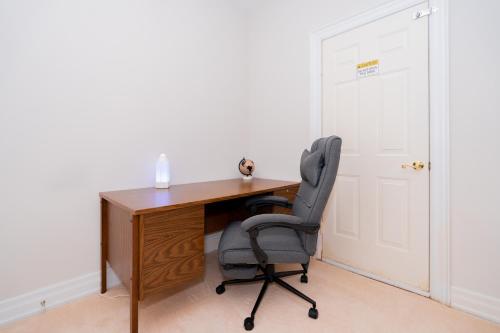 an office with a desk and a chair at Frybrook in Richmond Hill
