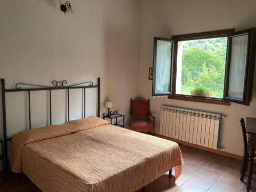 Postel nebo postele na pokoji v ubytování Agriturismo Pilato