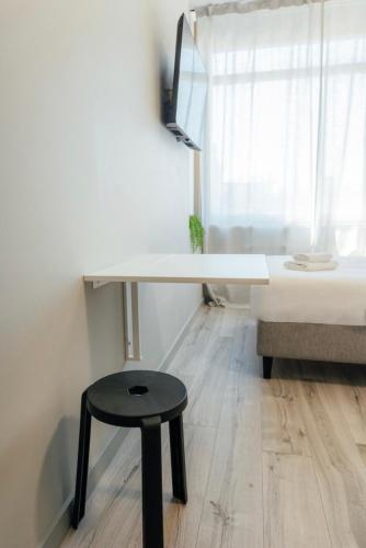 Postel nebo postele na pokoji v ubytování Aparthotel Aurum