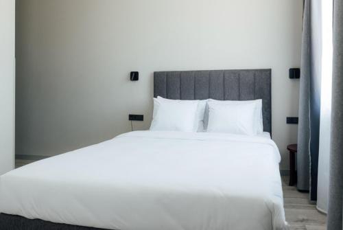 Postel nebo postele na pokoji v ubytování Aparthotel Aurum