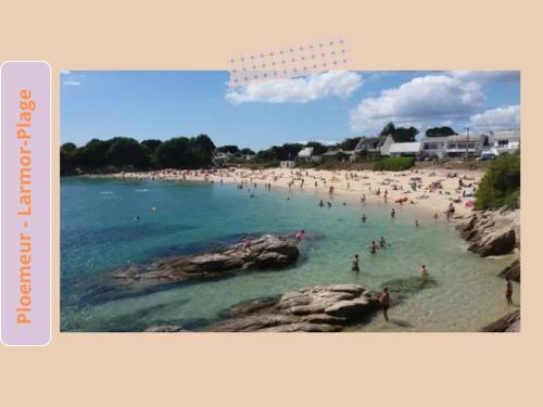 a group of people in the water at a beach at Suite Bretagne - Billard, Spa, Ciné- Proche Lorient in Plouay