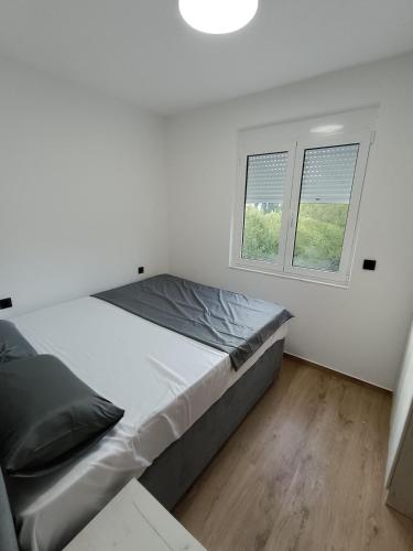 Postel nebo postele na pokoji v ubytování ApartmentsMD apartment 3 for real enjoyment