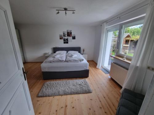 Postel nebo postele na pokoji v ubytování Ferienwohnung Kaiserblick