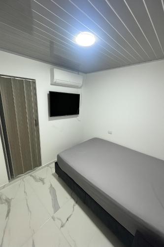 Postel nebo postele na pokoji v ubytování Hotel MONARCA