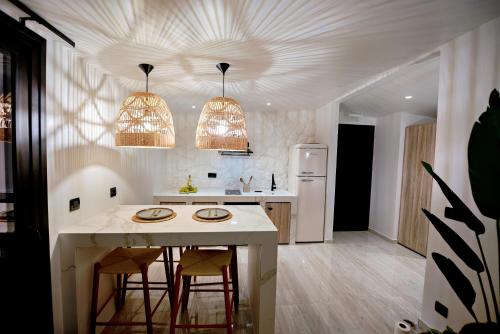 Η κουζίνα ή μικρή κουζίνα στο Ares Suites 3