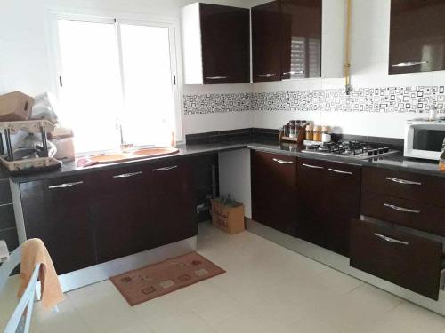 Kuchyň nebo kuchyňský kout v ubytování Appartement Vue sur Mer