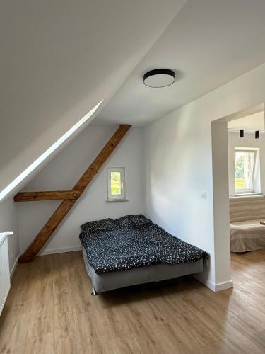 Ένα ή περισσότερα κρεβάτια σε δωμάτιο στο Apartament u Kuby