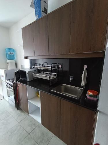 Η κουζίνα ή μικρή κουζίνα στο Residence Next Door Escape