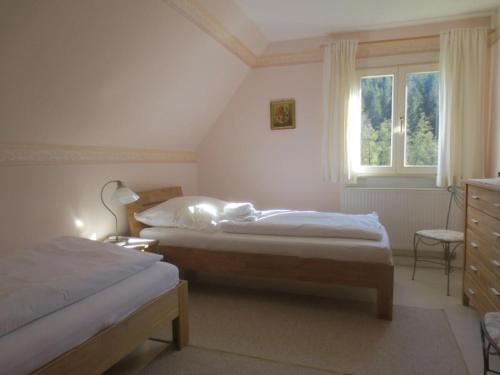 Postel nebo postele na pokoji v ubytování Holiday home Tauchert