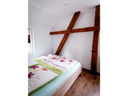Ferienwohnung Kirsche - On the fruit treeにあるベッド