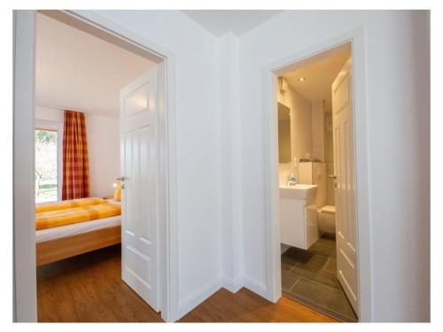 Ένα ή περισσότερα κρεβάτια σε δωμάτιο στο Pleasant apartment in Süddorf