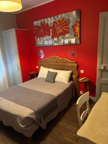 Ένα ή περισσότερα κρεβάτια σε δωμάτιο στο Hôtel Le Pont de l'Aube