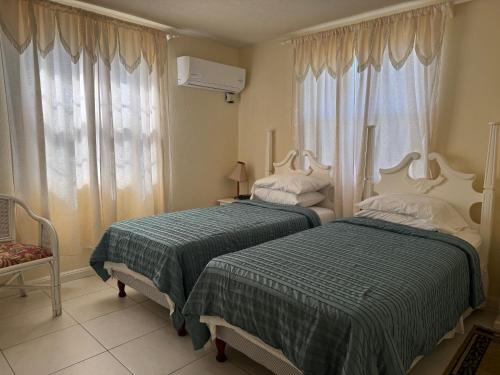 Krevet ili kreveti u jedinici u okviru objekta AnnJenn Apartments