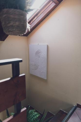a painting on the wall of a room at Il fienile di Rosy in Ardenno