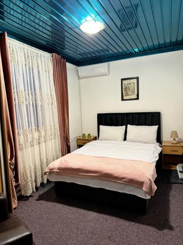 Guesthouse Prenociste Faraonにあるベッド
