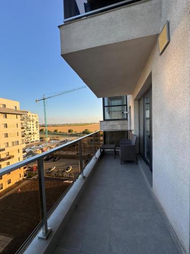 a balcony of a building with a view of a city at TAN GoLD in Constanţa