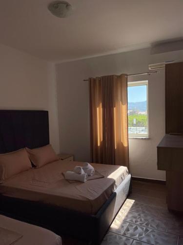 Postel nebo postele na pokoji v ubytování TH4 Shkoder