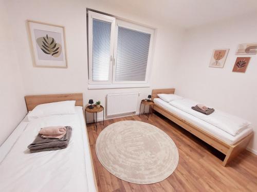 Кровать или кровати в номере PB Comfort Stay - 2Bedrooms & Free Parking
