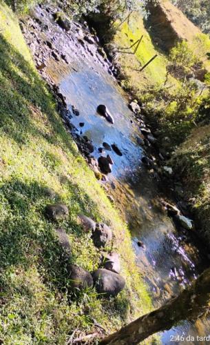 a group of rocks in a stream of water at Cabana in Annitapolis