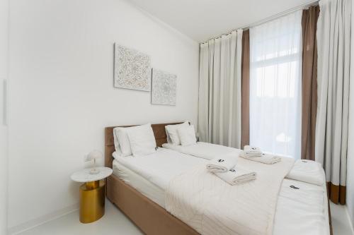 Un pat sau paturi într-o cameră la Apartament Przy Fali Sianożęty