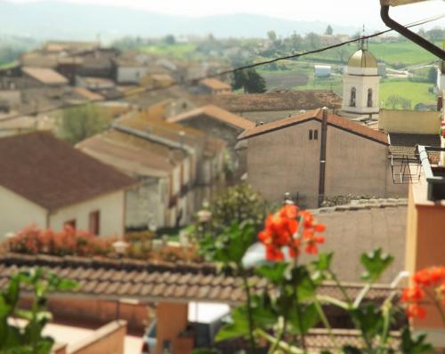 a view of a town with a white tower at Domus Tua in Pietrelcina