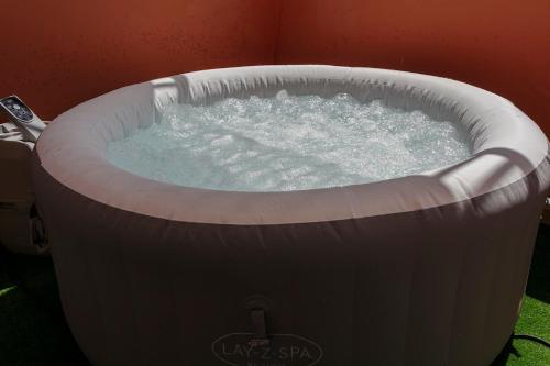 a large hot tub with water in it at 6-person appartment, terrace and spa in Marrakech