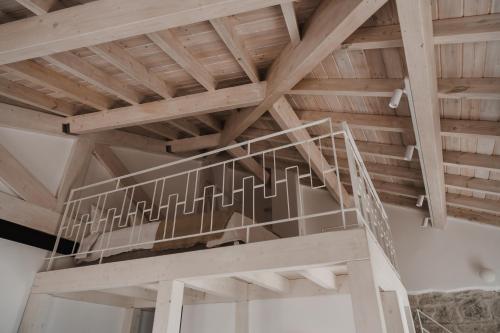 a staircase in the ceiling of a building at Stella Maris in Pythagoreio