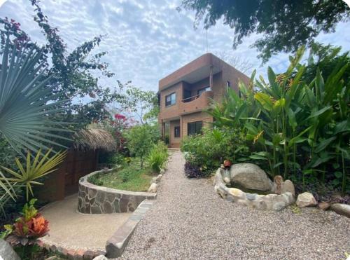 Κήπος έξω από το Casa de los Pájaros 3, nature near the beach