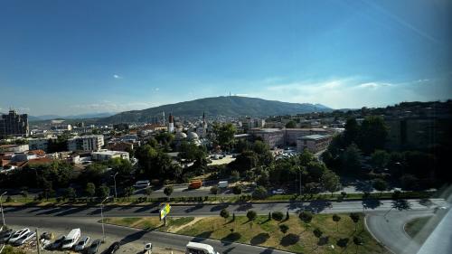 an aerial view of a city with a street at The Urban Nest Central Skopje Cozy 2BR Ap in Skopje