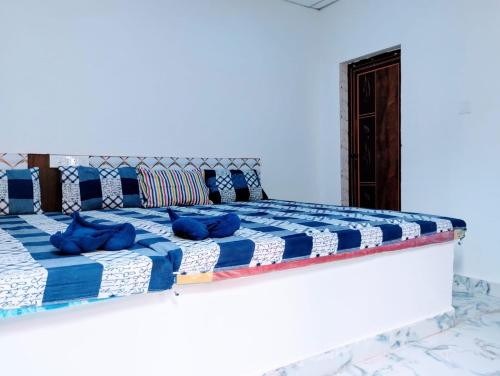 Postel nebo postele na pokoji v ubytování Sea Bird Resort Resturant