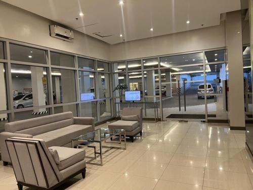 Coin salon dans l'établissement Relax in Style Walk into City, Roxas Market with Pool