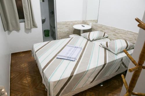 Cama o camas de una habitación en Hotel Vitória