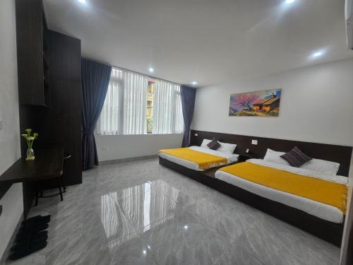 Ένα ή περισσότερα κρεβάτια σε δωμάτιο στο The Dang's Home in Lao Cai
