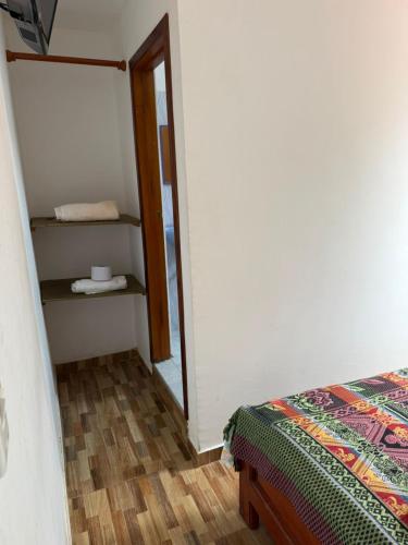Postel nebo postele na pokoji v ubytování Hotel El Peñon Santander