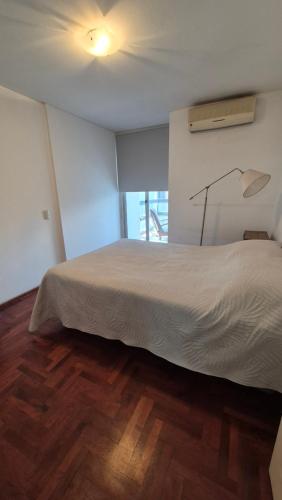 Postel nebo postele na pokoji v ubytování Espacio C Obispo Salguero