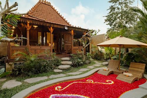 Сад в Hidden Saren Villa Ubud