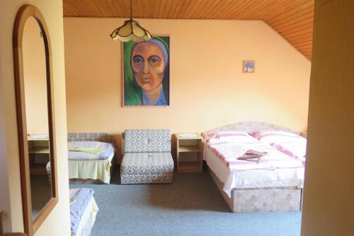 Postel nebo postele na pokoji v ubytování Penzion Oliver