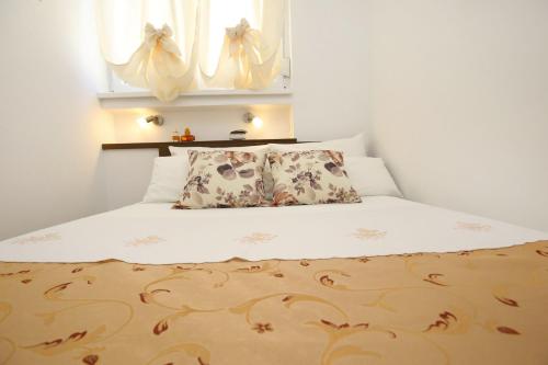 Postel nebo postele na pokoji v ubytování Apartment Amber