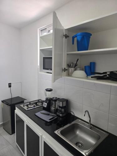 Kuchyň nebo kuchyňský kout v ubytování BUSINESS CLASS Departamentos